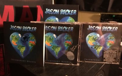 Triumphant Hearts signed by Jason Becker, Uli Jon Roth and Guthrie Govan